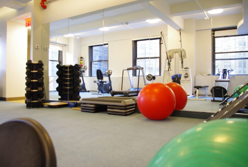 gym with mirror Grand Central Physical Therapy and Hand Therapy